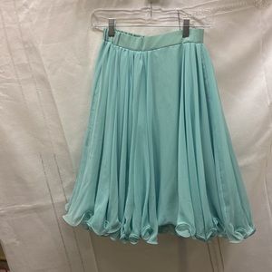 Vintage tulle flare skirt with hook and eye close on side.